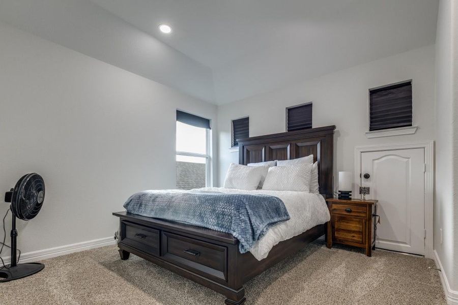 It has a small window for natural light and a unique small door, adding character to the room.