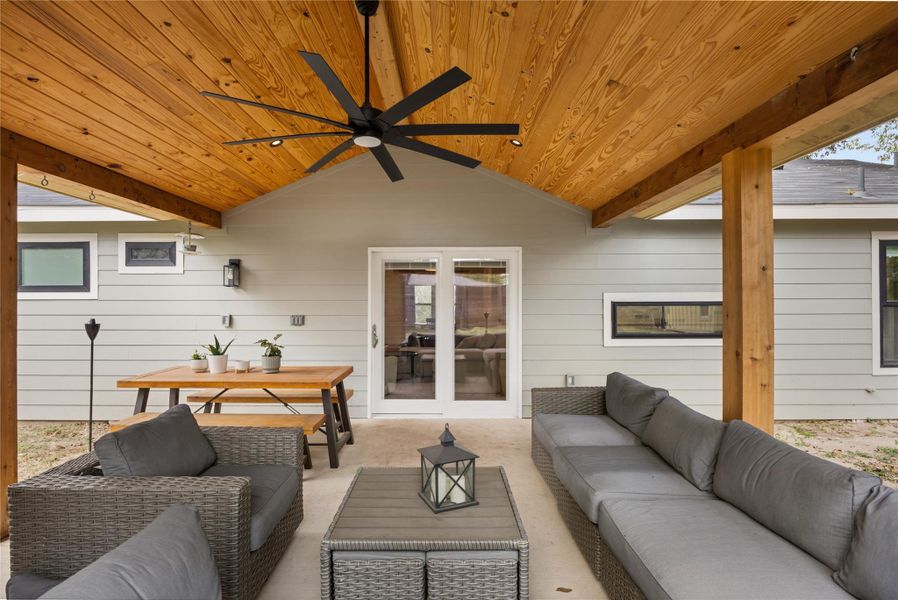 View of patio featuring a ceiling fan and outdoor lounge area