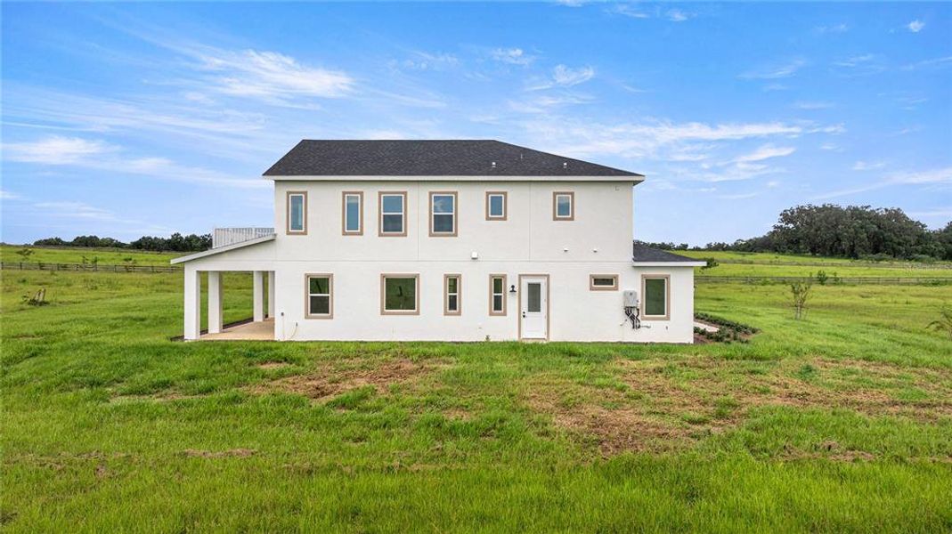 Front exterior of a new home in , Morriston, FL, highlighting curb appeal (Image 27). Front exterior of a new home in , Morriston, FL, highlighting curb appeal (Image 27).