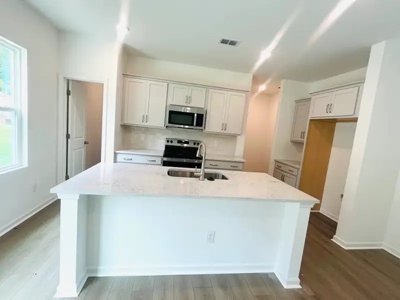 Furnished interior view inside a new home in Middleton Farms, Middlesex (Image 4).