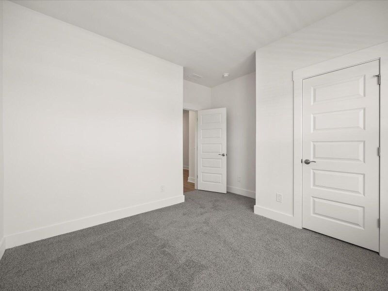 Spacious, unfurnished interior of a new home in The Coves at Lakes of Cane Bay, Summerville (Image 36). Spacious, unfurnished interior of a new home in The Coves at Lakes of Cane Bay, Summerville (Image 36).