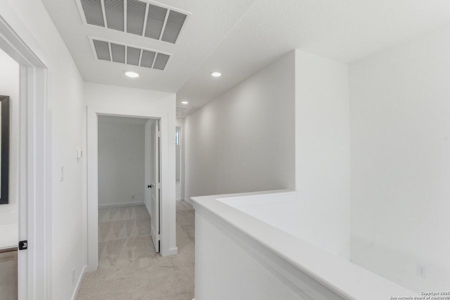 Spacious, unfurnished interior of a new home in The Crossvine – Garden Homes, Schertz (Image 37).