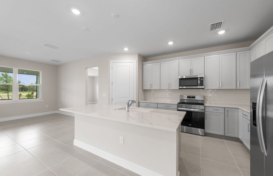 Furnished interior view inside a new home in Del Webb Oak Creek, North Fort Myers (Image 11).