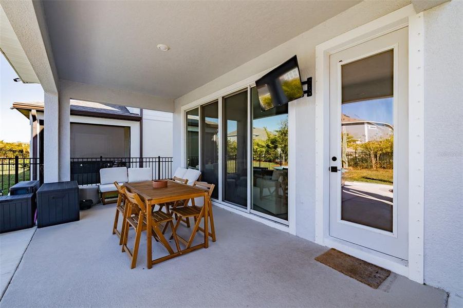 Exterior details and patio area of a home in Waterset Garden Series, Apollo Beach (Image 25).