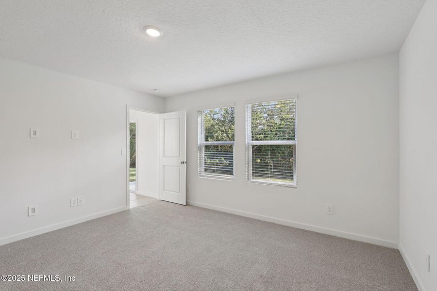 Spacious, unfurnished interior of a new home in Flagler Village - Classic Series, Palm Coast (Image 16).