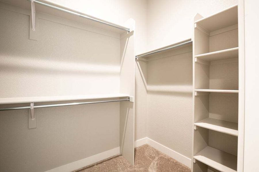 Primary Closet - Not Actual Home - Finishes May Vary