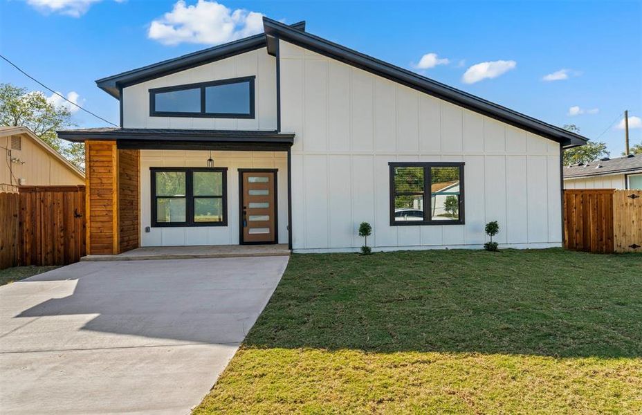 View of front of home with board and batten siding