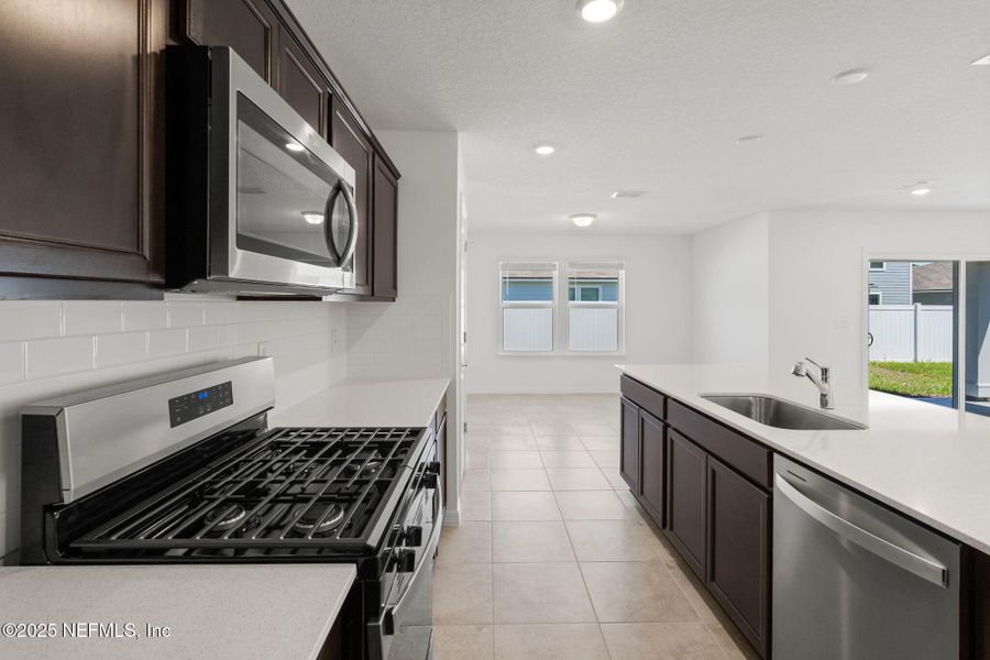 Furnished interior view inside a new home in Wells Landing, Jacksonville (Image 4).