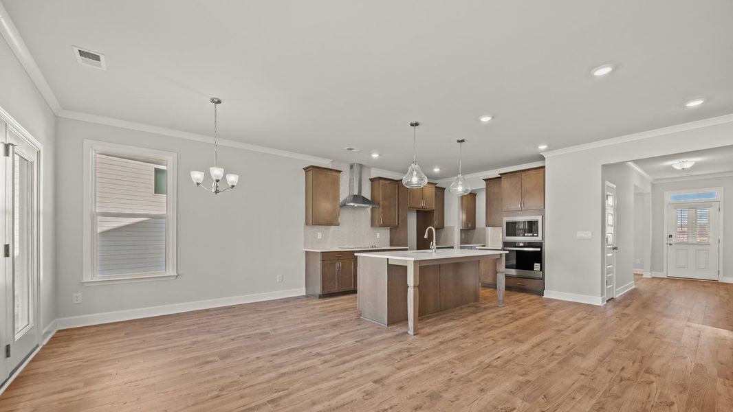 Representative furnished interior of a home built from the Summit by D.R. Horton in Evergreen Crossing, Locust Grove (Image 7).