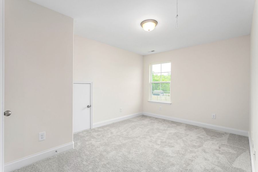 Representative unfurnished interior of a home built from the Jamestown by Keystone Homes NC in Sullivans Reserve, Walkertown (Image 41).