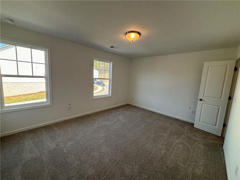 Spacious, unfurnished interior of a new home in Arbors at Richland Creek, Buford (Image 28).