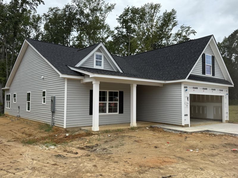 Front exterior of a new home in , Orangeburg, SC, highlighting curb appeal (Image 6).