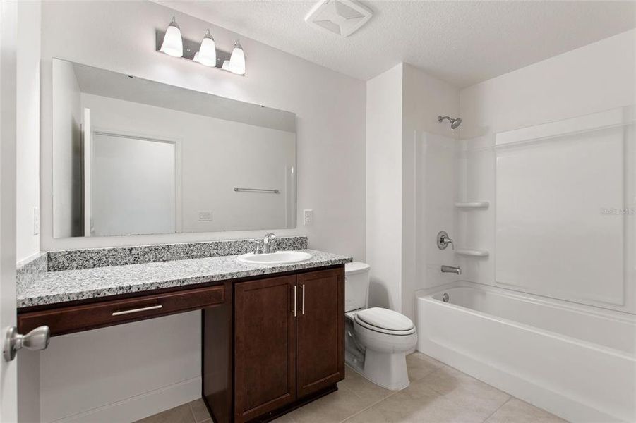 Furnished interior view inside a new home in , Davenport (Image 10).