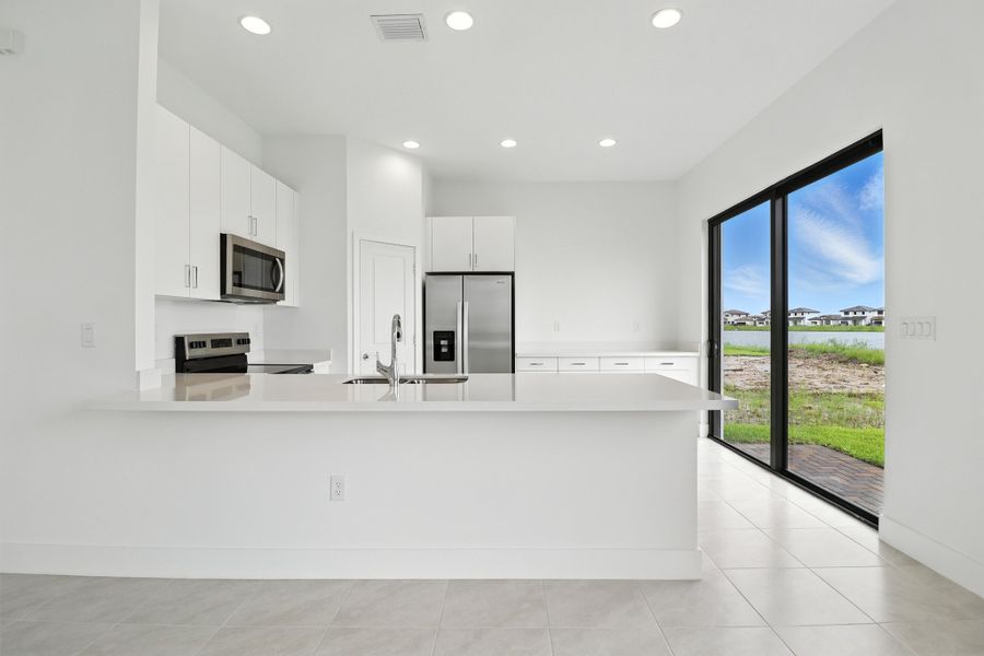 Furnished interior view inside a new home in Maple Ridge, Ave Maria (Image 5).