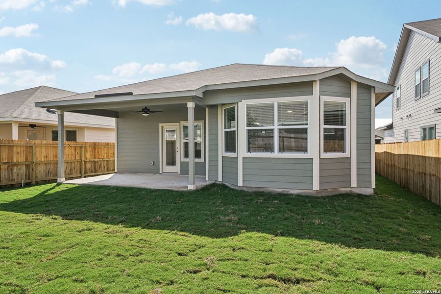 Exterior details and patio area of a home in Estancia Ranch - Premier Series, San Antonio (Image 3).