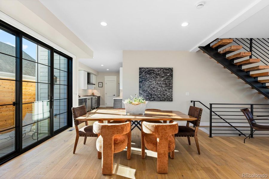 Dining room opens to the fully fenced courtyardand to the kitchen Dining room opens to the fully fenced courtyardand to the kitchen