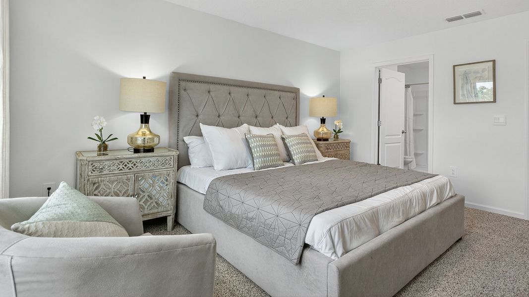 Representative furnished interior of a home built from the Carson by D.R. Horton in Trout River, Jacksonville (Image 12).