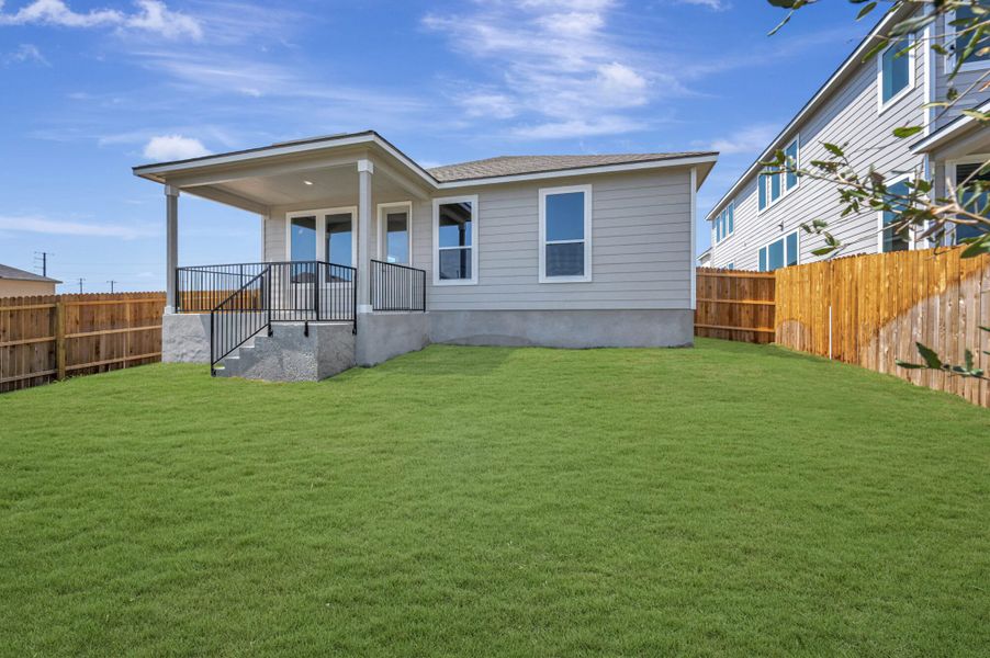 Exterior details and patio area of a home in The Meadows at Hunters Ranch, San Antonio (Image 3).
