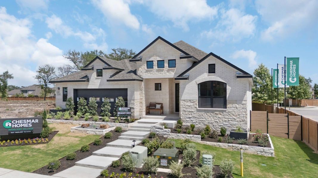 Front exterior of a new home in Highland Village, Georgetown, TX, highlighting curb appeal (Image 33). Front exterior of a new home in Highland Village, Georgetown, TX, highlighting curb appeal (Image 33).