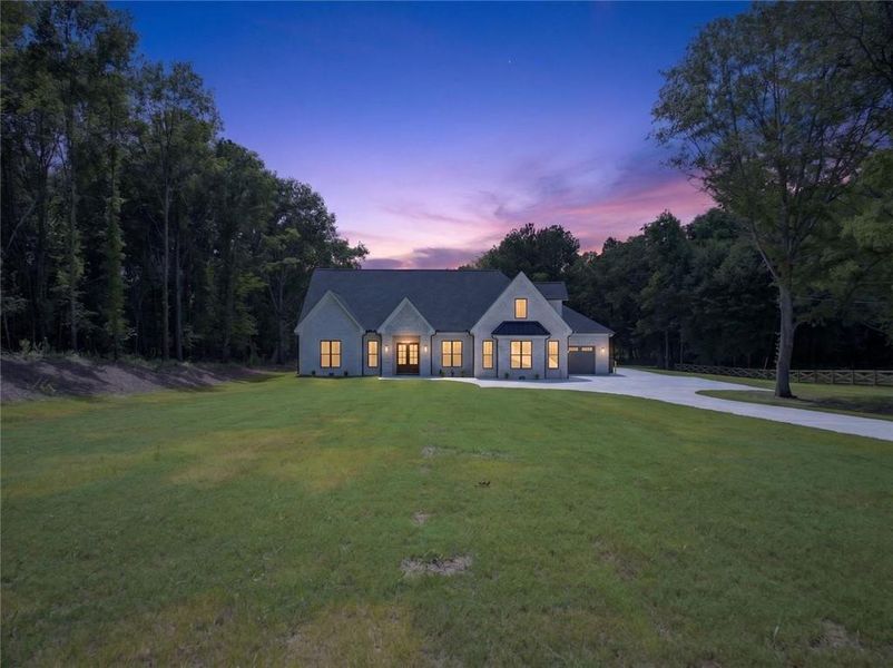 Front exterior of a new home in , Monroe, GA, highlighting curb appeal (Image 26). Front exterior of a new home in , Monroe, GA, highlighting curb appeal (Image 26).