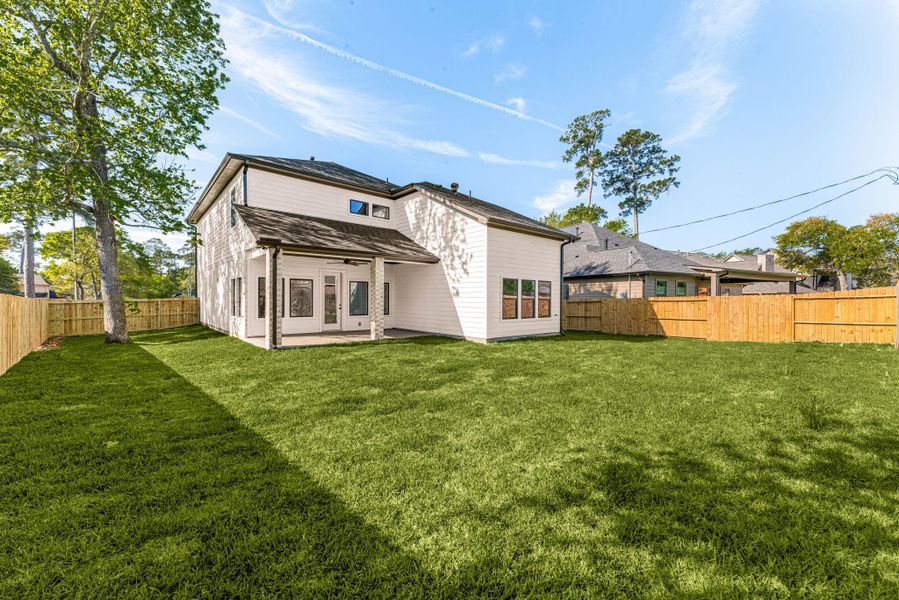 Exterior details and patio area of a home in , Tomball (Image 4).