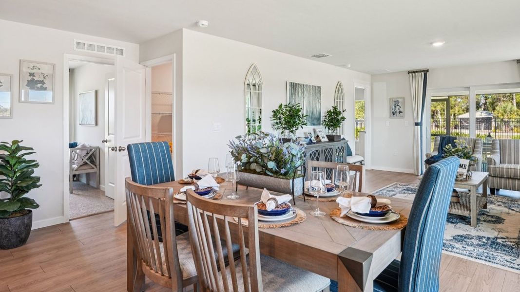 Furnished interior view inside a new home in Coral Bay - Express & Tradition, North Fort Myers (Image 10).