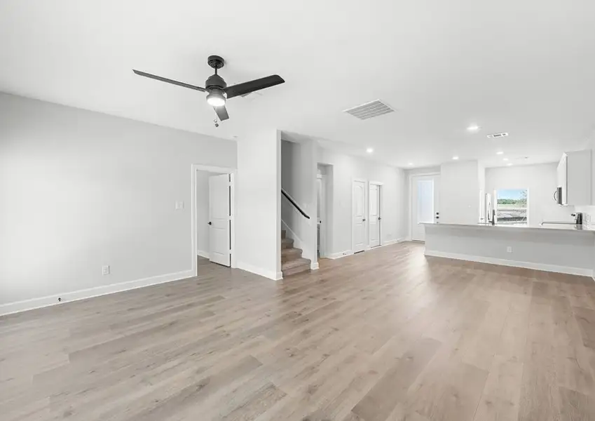 In the Driftwood plan, the kitchen, dining room and family room sit adjacent to one another. In the Driftwood plan, the kitchen, dining room and family room sit adjacent to one another.