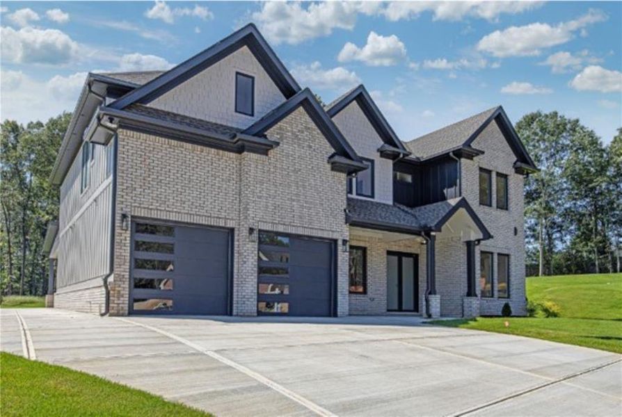 Front exterior of a new home in , Auburn, GA, highlighting curb appeal (Image 25).