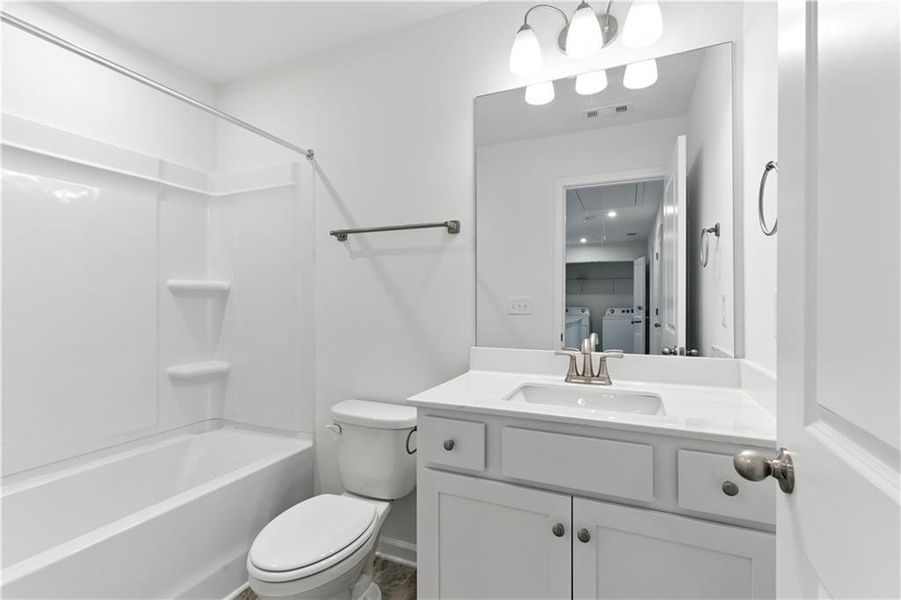 Furnished interior view inside a new home in The View at Groover’s Lake, Lithia Springs (Image 5).