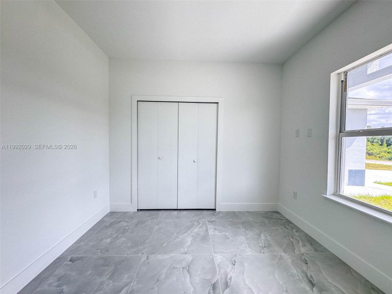 Spacious, unfurnished interior of a new home in , Lehigh Acres (Image 16).