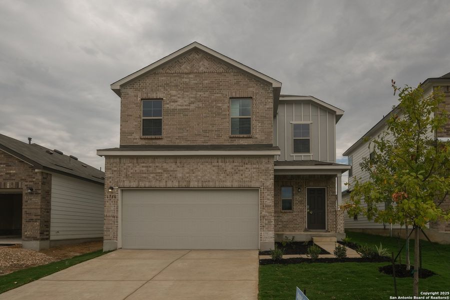 Front exterior of a new home in Winding Brook, San Antonio, TX, highlighting curb appeal (Image 2). Front exterior of a new home in Winding Brook, San Antonio, TX, highlighting curb appeal (Image 2).