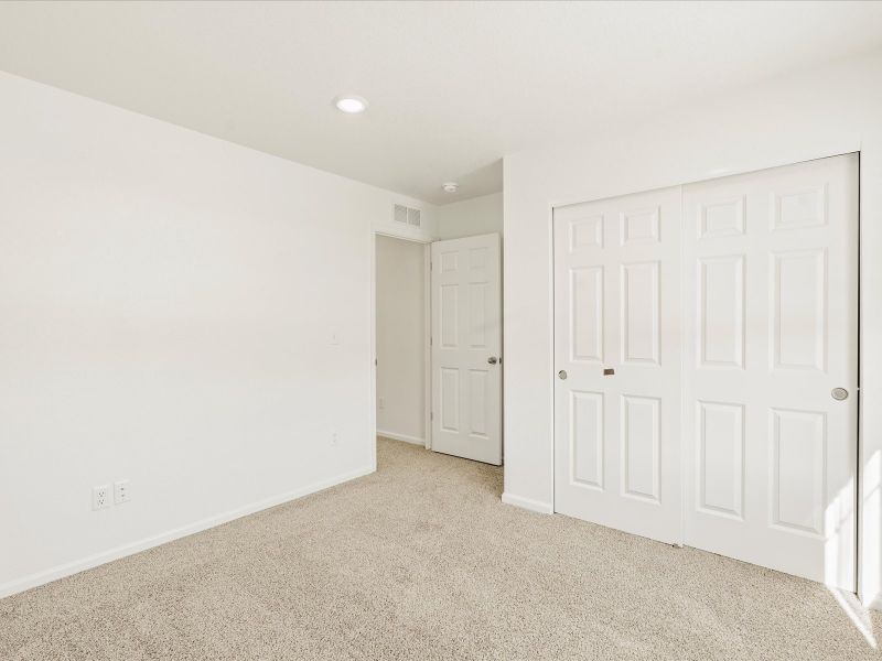 Spacious, unfurnished interior of a new home in Lorson Ranch: The Trail Collection, Colorado Springs (Image 11).