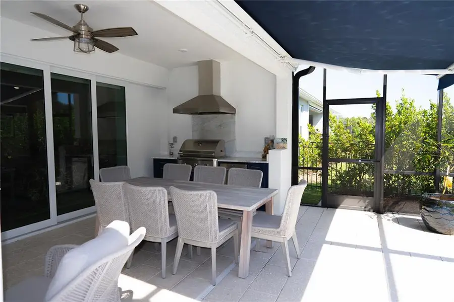 Exterior details and patio area of a home in , Sarasota (Image 25).