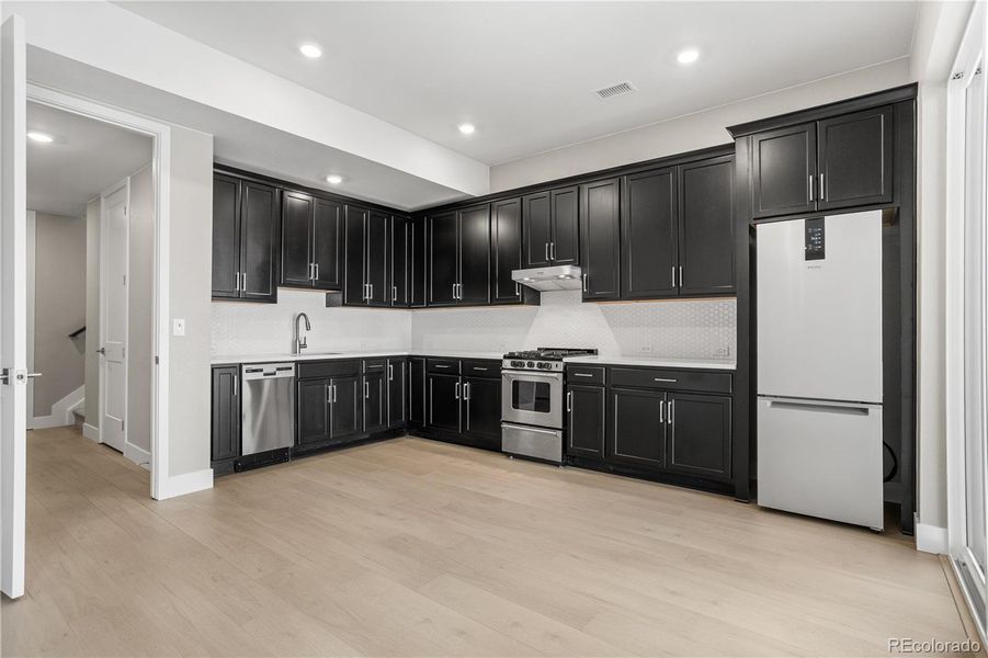 Furnished interior view inside a new home in Tribute at Lyric, Lone Tree (Image 13). Furnished interior view inside a new home in Tribute at Lyric, Lone Tree (Image 13).