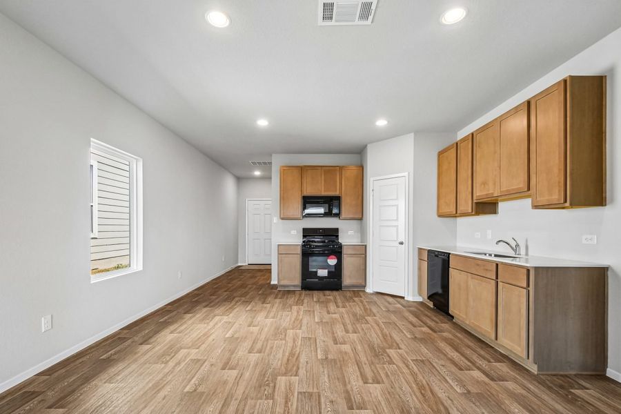 Furnished interior view inside a new home in Hymeadow, San Marcos (Image 6).