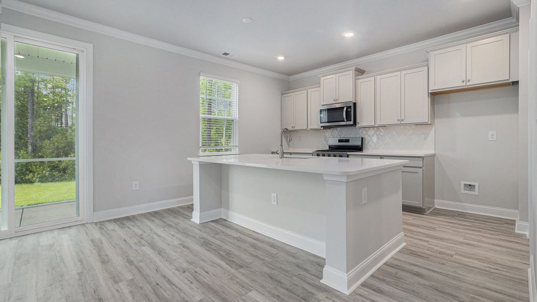 Furnished interior view inside a new home in Chapman Village, Conway (Image 7).