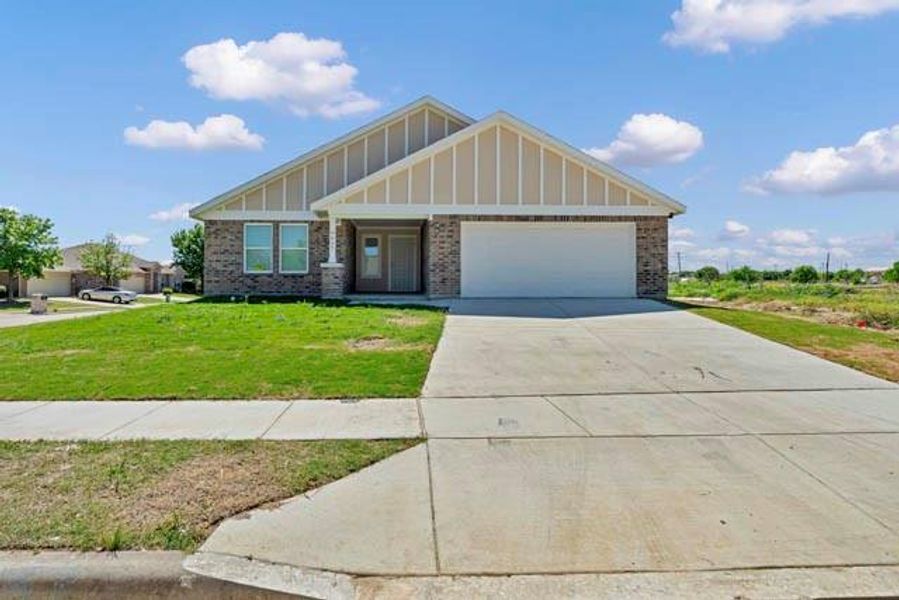 Front exterior of a new home in , Fort Worth, TX, highlighting curb appeal (Image 16).