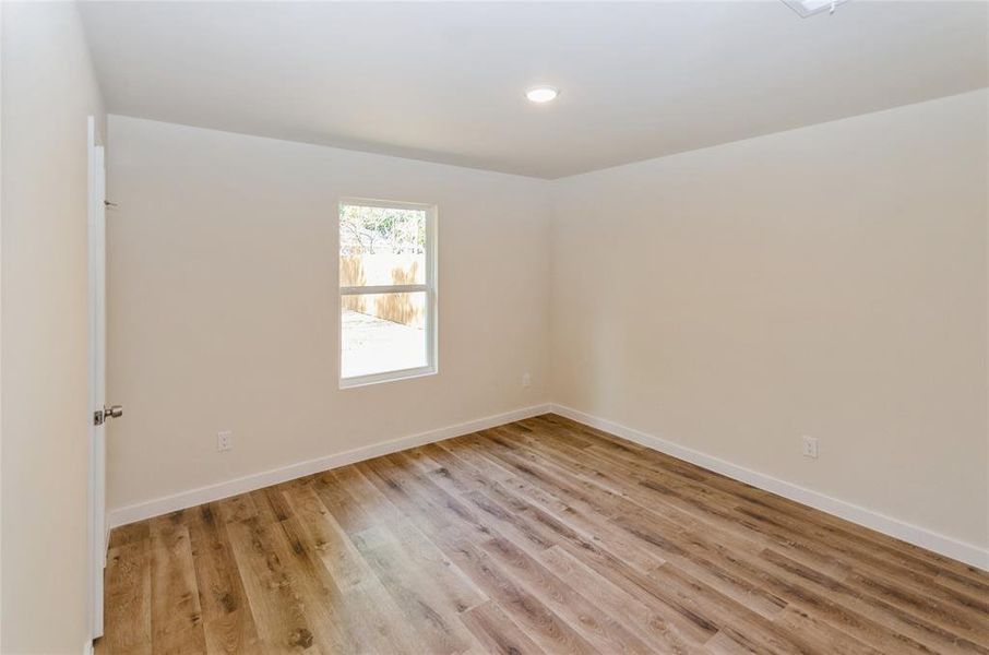 Empty room featuring light hardwood / wood-style flooring