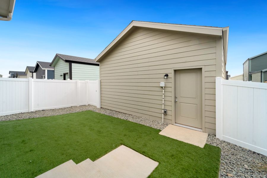 Representative exterior photo of a completed home built from the Telluride by Baessler Homes in Liberty Draw, Evans, CO (Image 21).