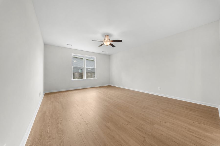 Representative unfurnished interior of a home built from the The Madison by Smith Family Homes in Camden Crossing, Savannah (Image 23).