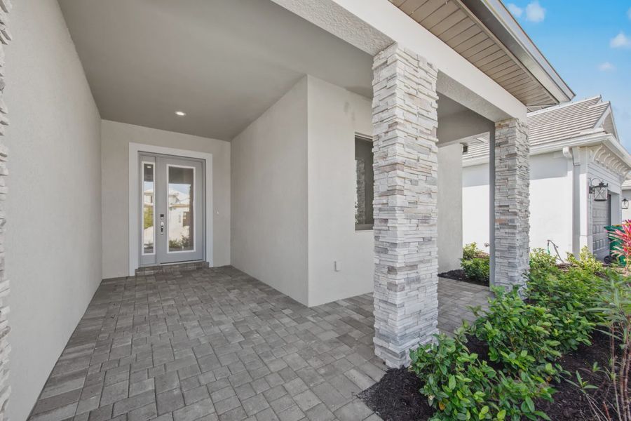 Representative exterior details of a home built from the Eventide 4 by Neal Communities in SkySail, Naples (Image 3).