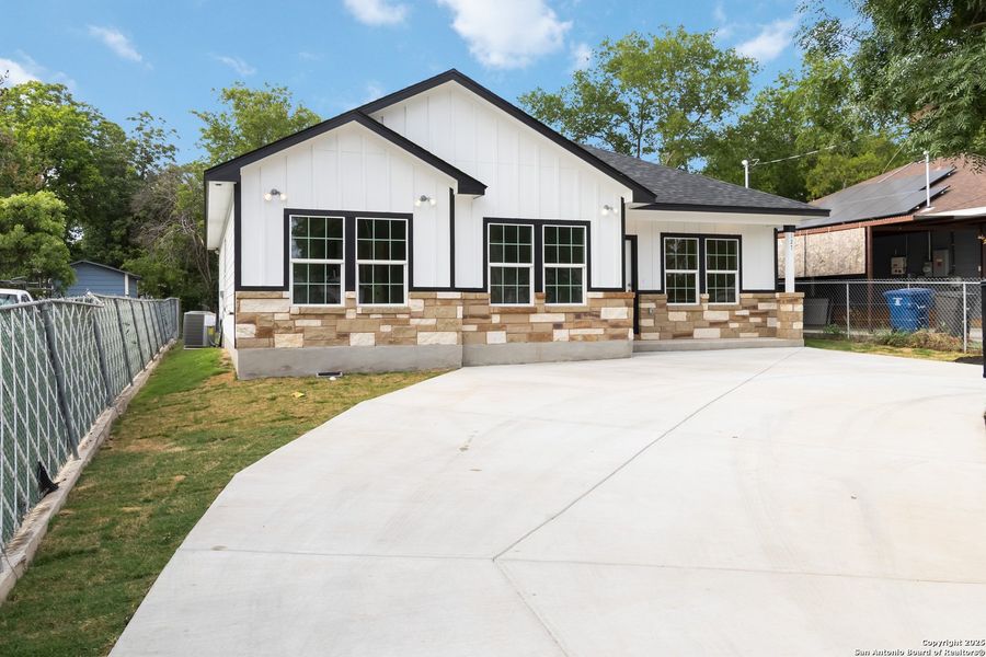 Front exterior of a new home in , San Antonio, TX, highlighting curb appeal (Image 14).