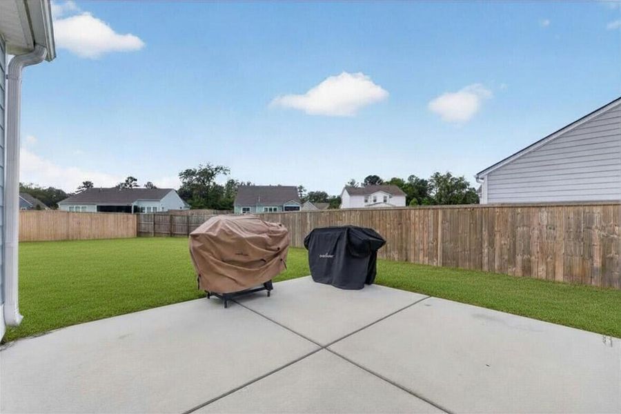 Exterior details and patio area of a home in , Johns Island (Image 28). Exterior details and patio area of a home in , Johns Island (Image 28).