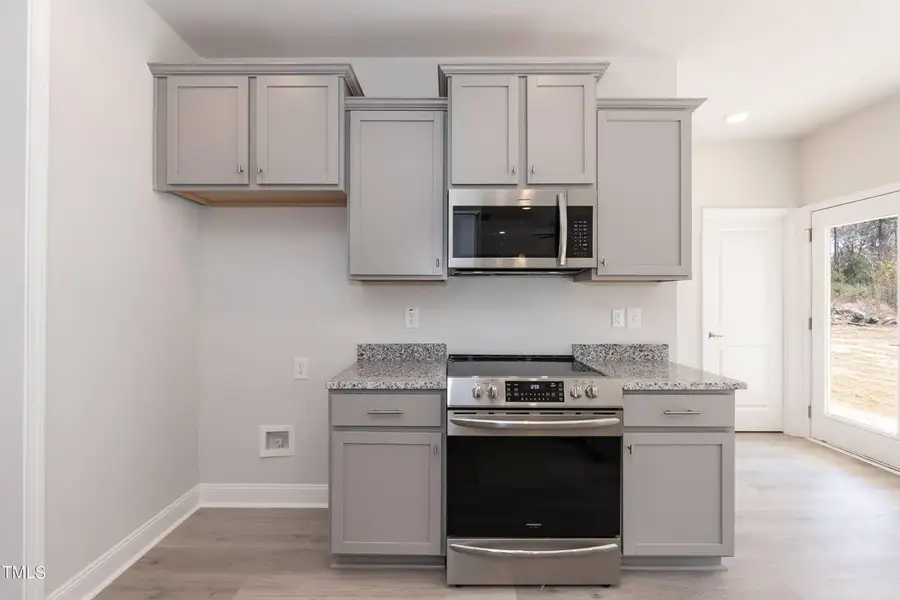 Representative furnished interior of a home built from the 2721 by Adams Homes in Hidden Pines, Cameron (Image 7).