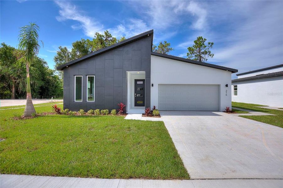 Front exterior of a new home in , Arcadia, FL, highlighting curb appeal (Image 1). Front exterior of a new home in , Arcadia, FL, highlighting curb appeal (Image 1).