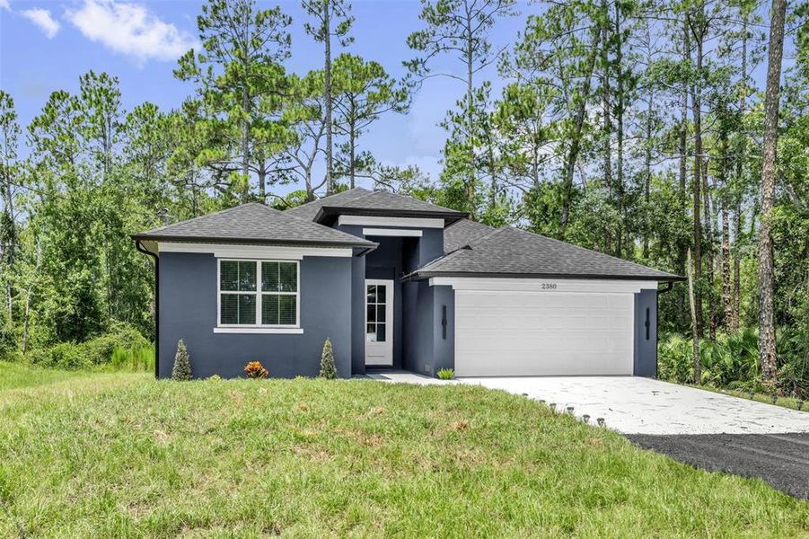 Front exterior of a new home in , Deland, FL, highlighting curb appeal (Image 19).