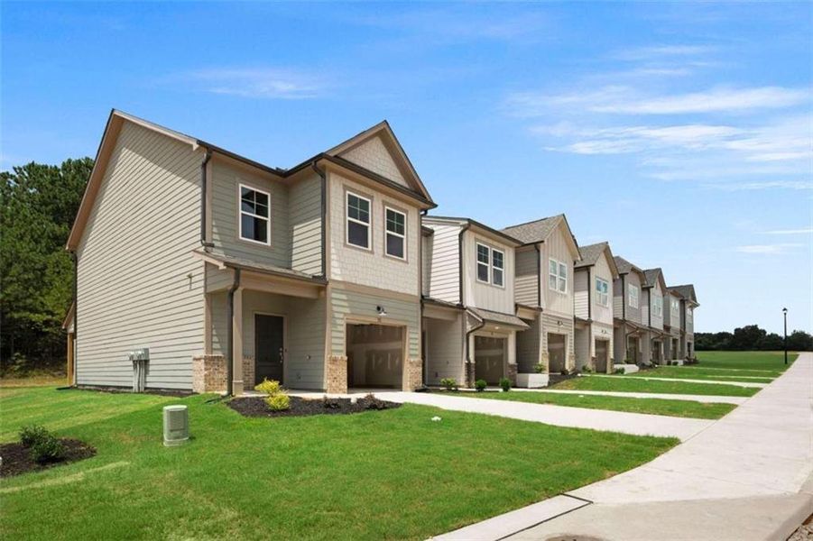 Front exterior of a new home in , Cedartown, GA, highlighting curb appeal (Image 44).