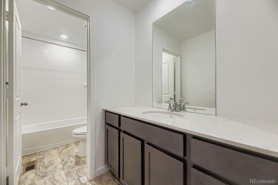 Furnished interior view inside a new home in Ken-Caryl Ranch, Littleton (Image 4).