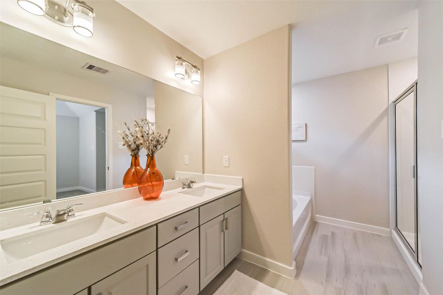 Photos are sample images from a previously built home with the same floor plan. Finishes and fixtures in the current home have been upgraded and may vary. Photos are sample images from a previously built home with the same floor plan. Finishes and fixtures in the current home have been upgraded and may vary.