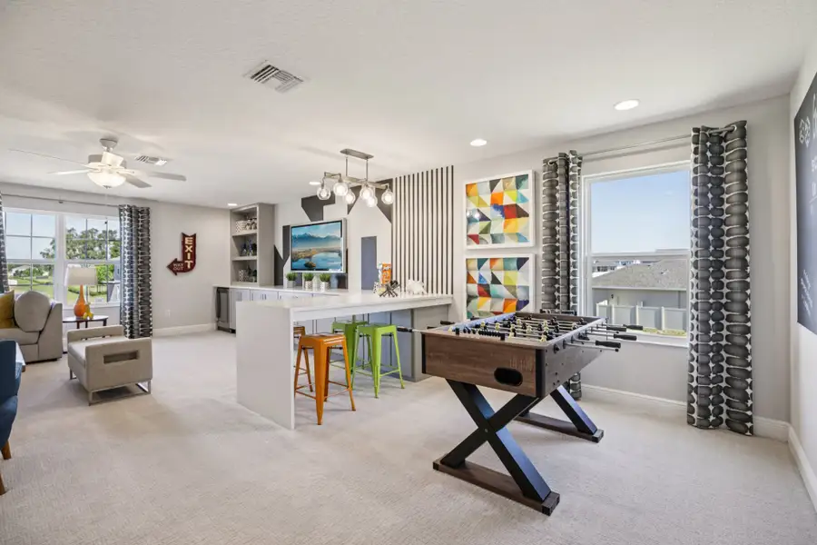 Representative furnished interior of a home built from the Palmer Executive by Risewell Homes in Bargrove Estates, Mount Dora (Image 33).